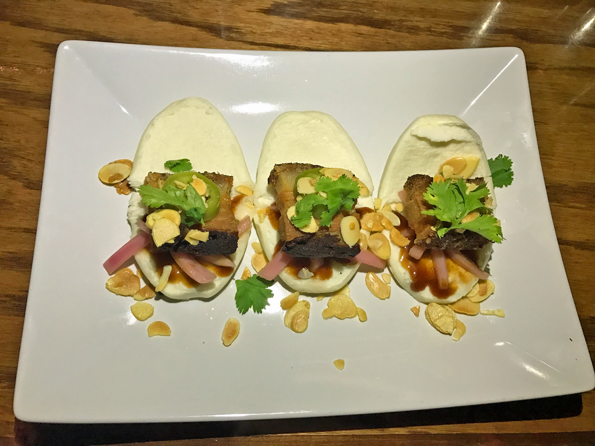 Pork Belly Steamed Buns at Cask & Ale are Excellent