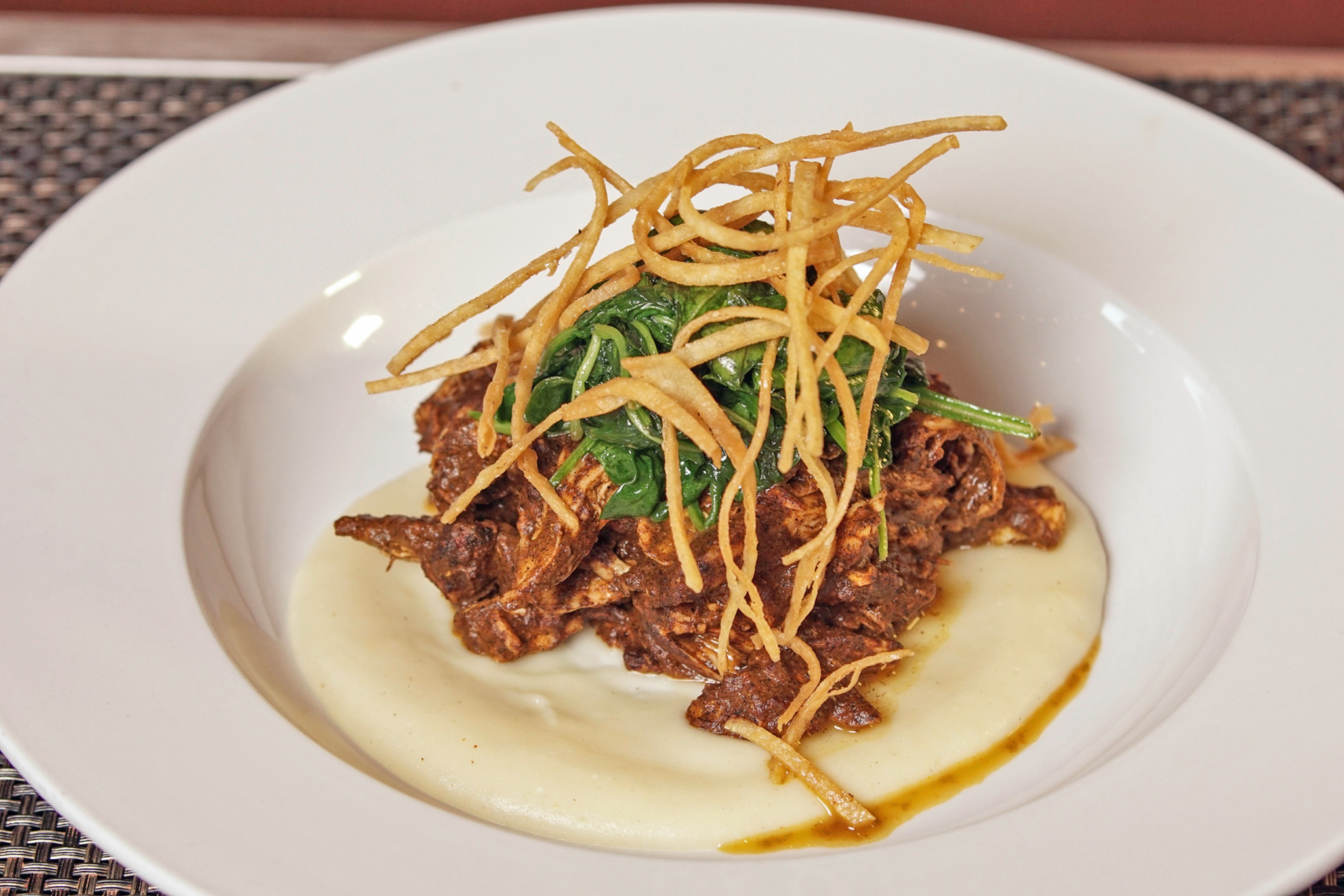 Chicken and Roasted Pumpkin Mole - celery root and russet purée, wilted greens, crispy corn tortilla