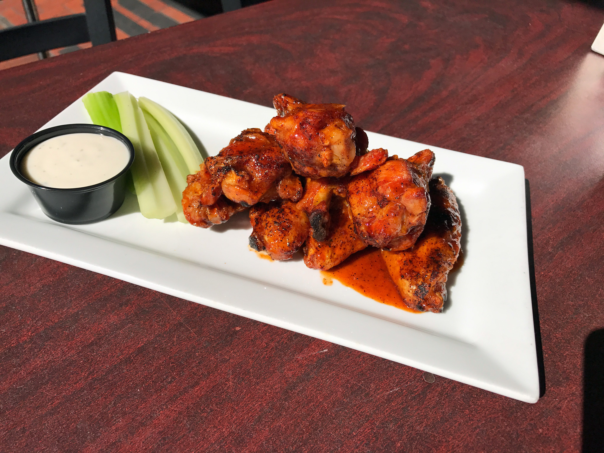 Spicy Honey Mandarin Glazed Signature Chicken Wings at Del Mar