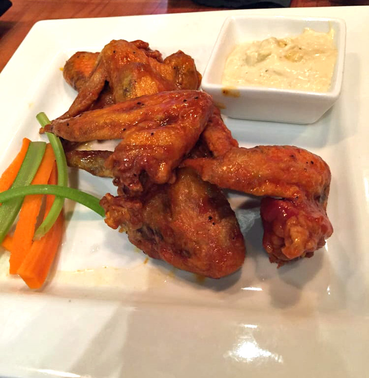 AIN'T NO THANG - 6 whole chicken wings tossed in our signature Buffalo sauce