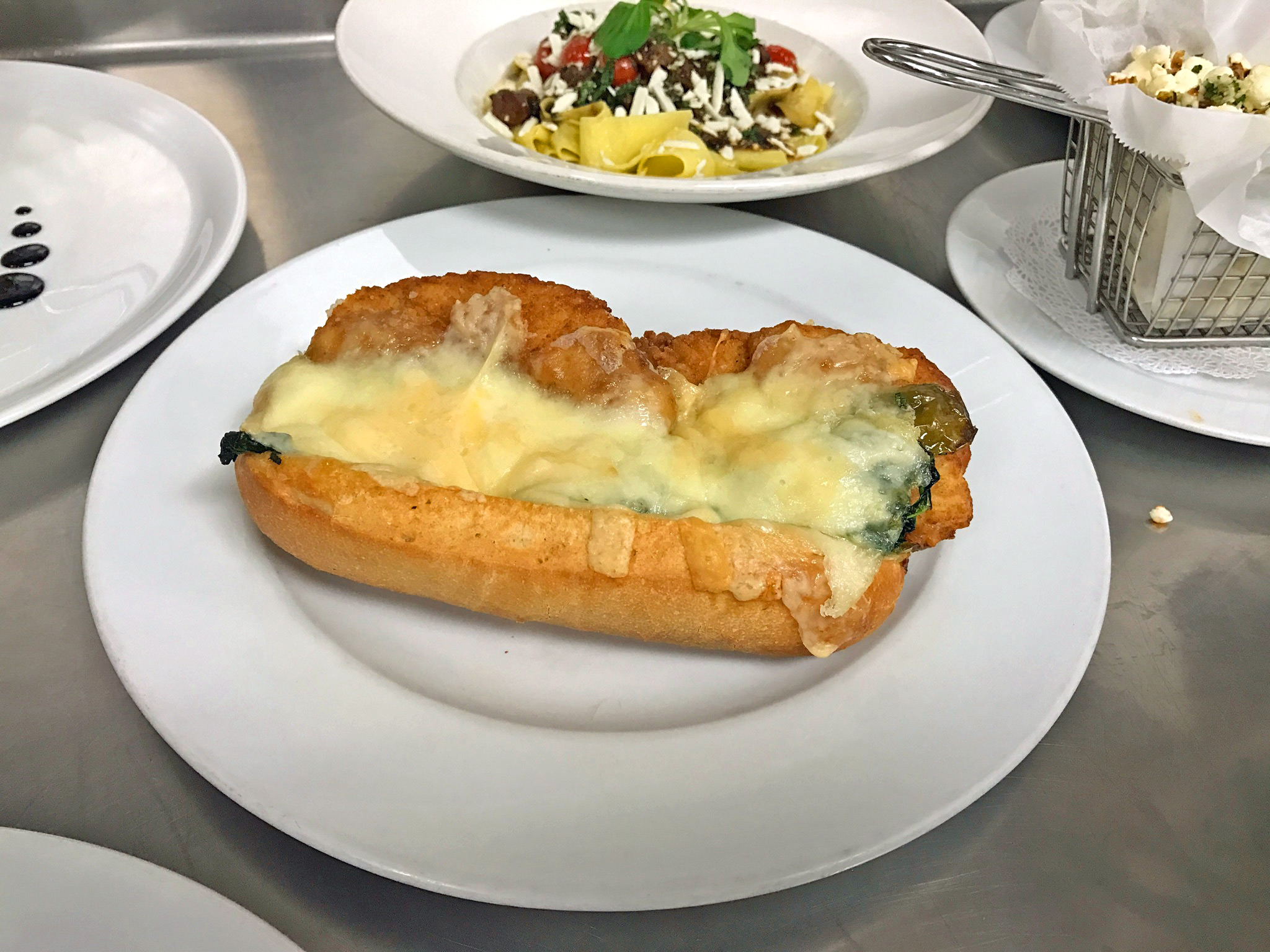Chicken Cutlet - broccoli rabe, Italian long hot pepper, mozzarella & parmesan cheese