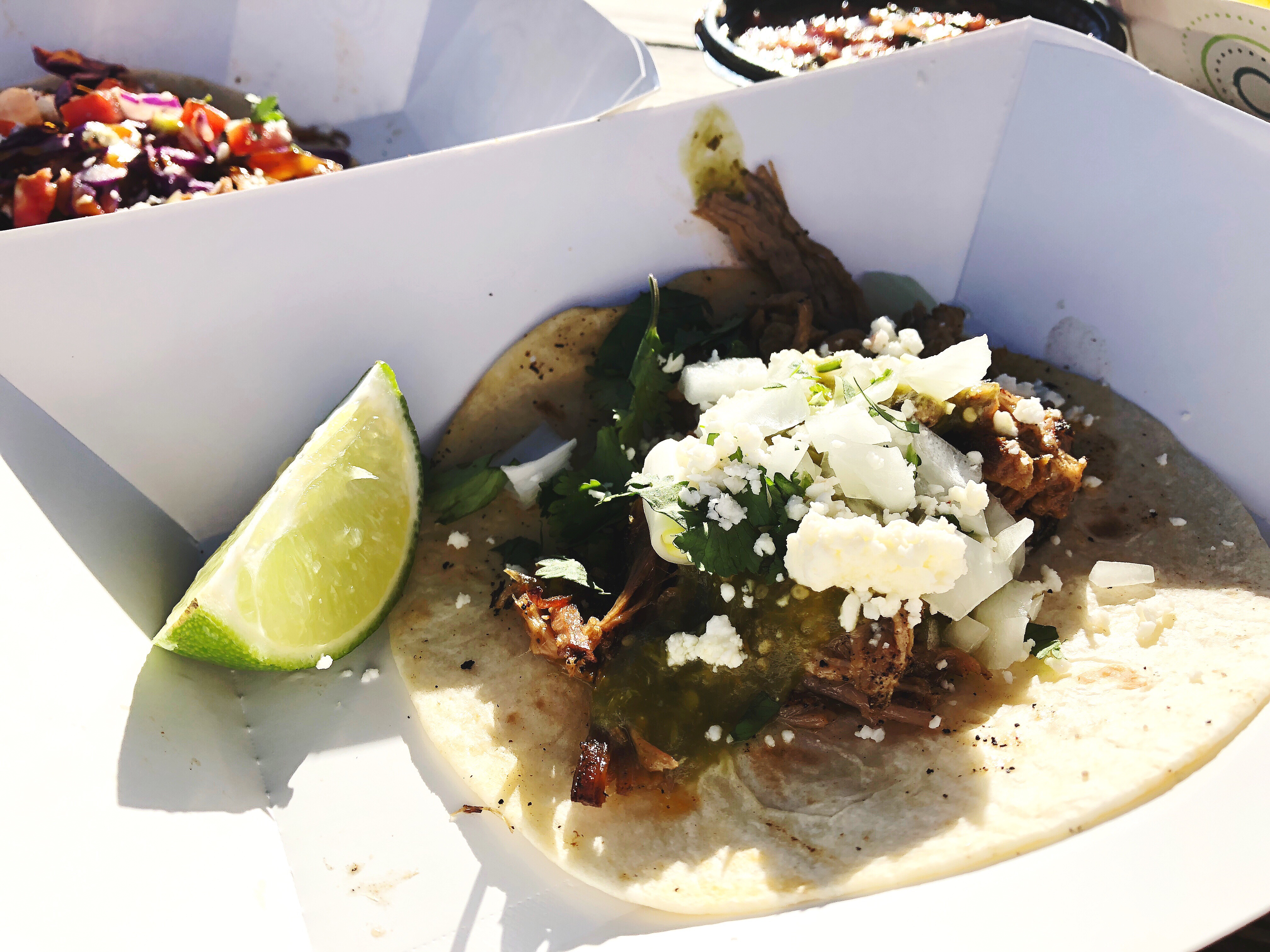 Mojo Pulled Pork Taco with Onions, Cilantro, Lime, Queso Fresco and Salsa Verde