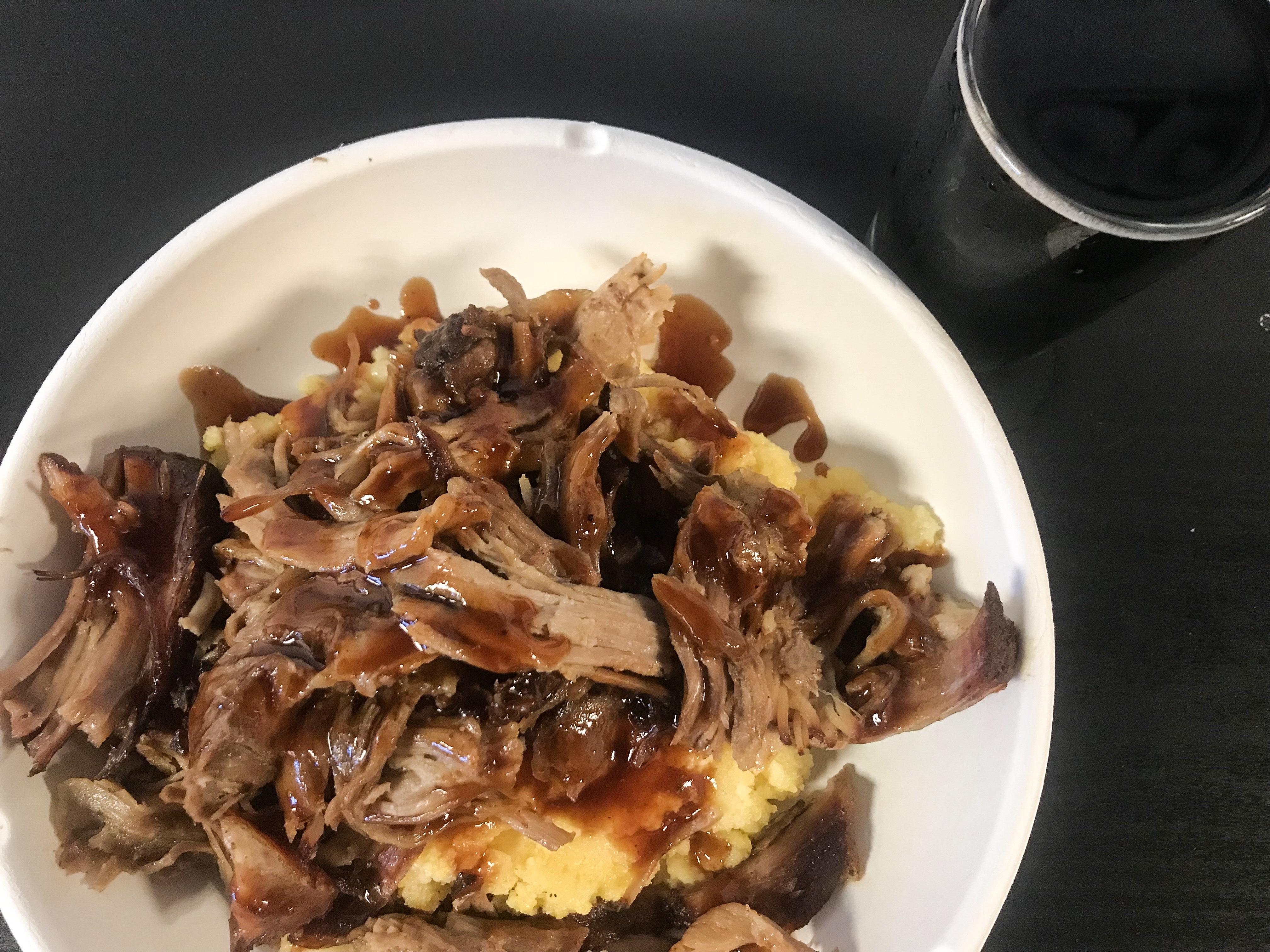 Pulled Pork with Stout BBQ sauce served with creamy polenta and Stern Line Stout