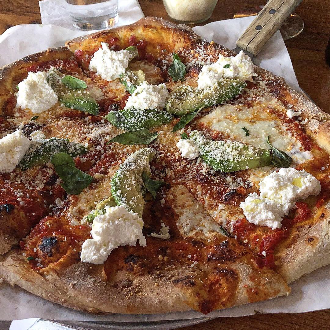 Margherita 2.0 with Tomato Sauce, Calabrian Chili, fresh Mozzarella, Parm, whipped Ricotta, Avocado and Basil from Noble Crust