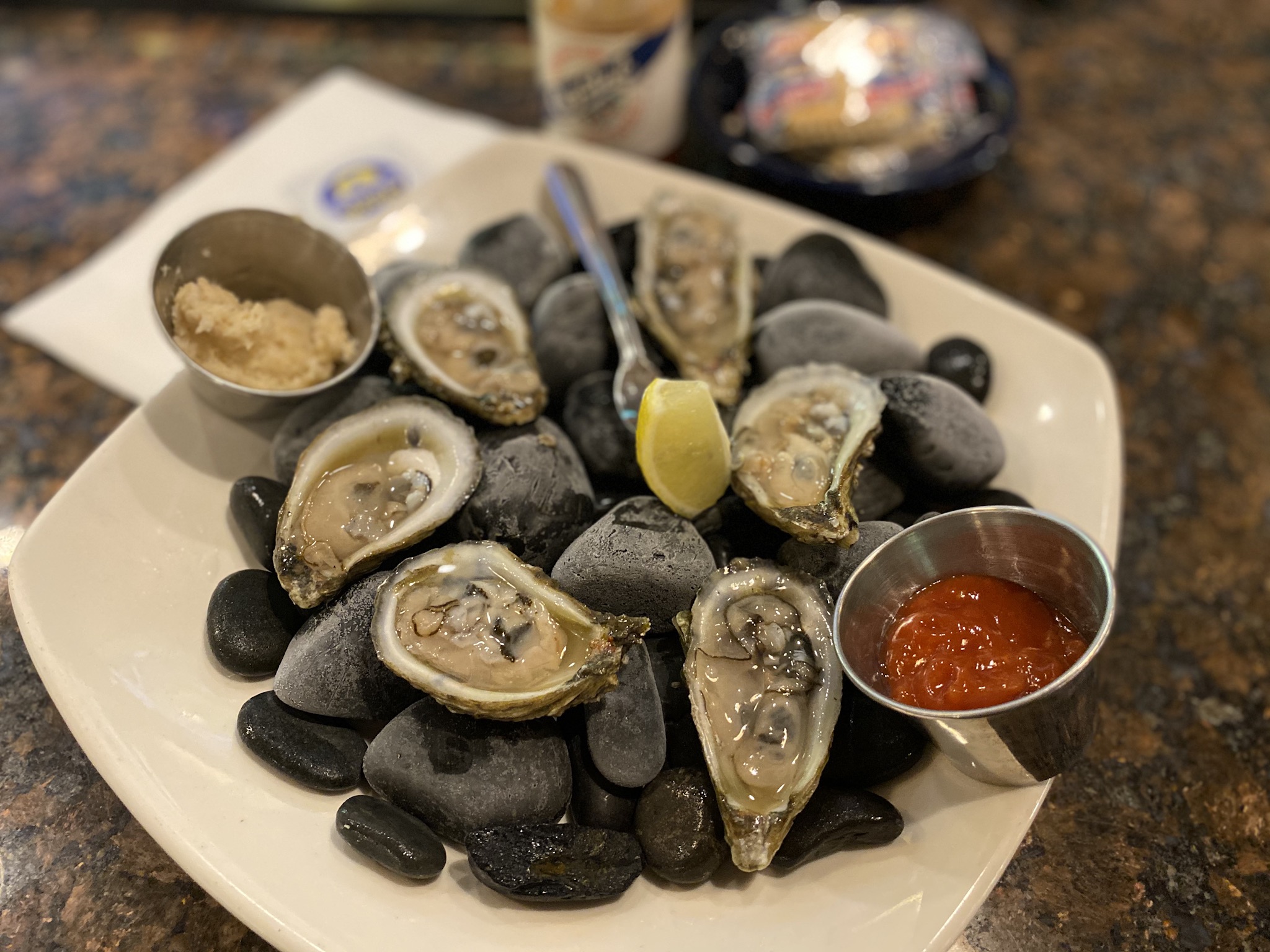 Oysters served on cold black stones