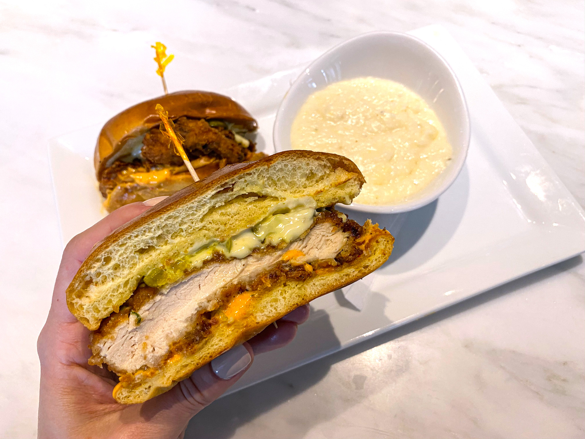 The Chicken Sandwich with Grits at The Dewey