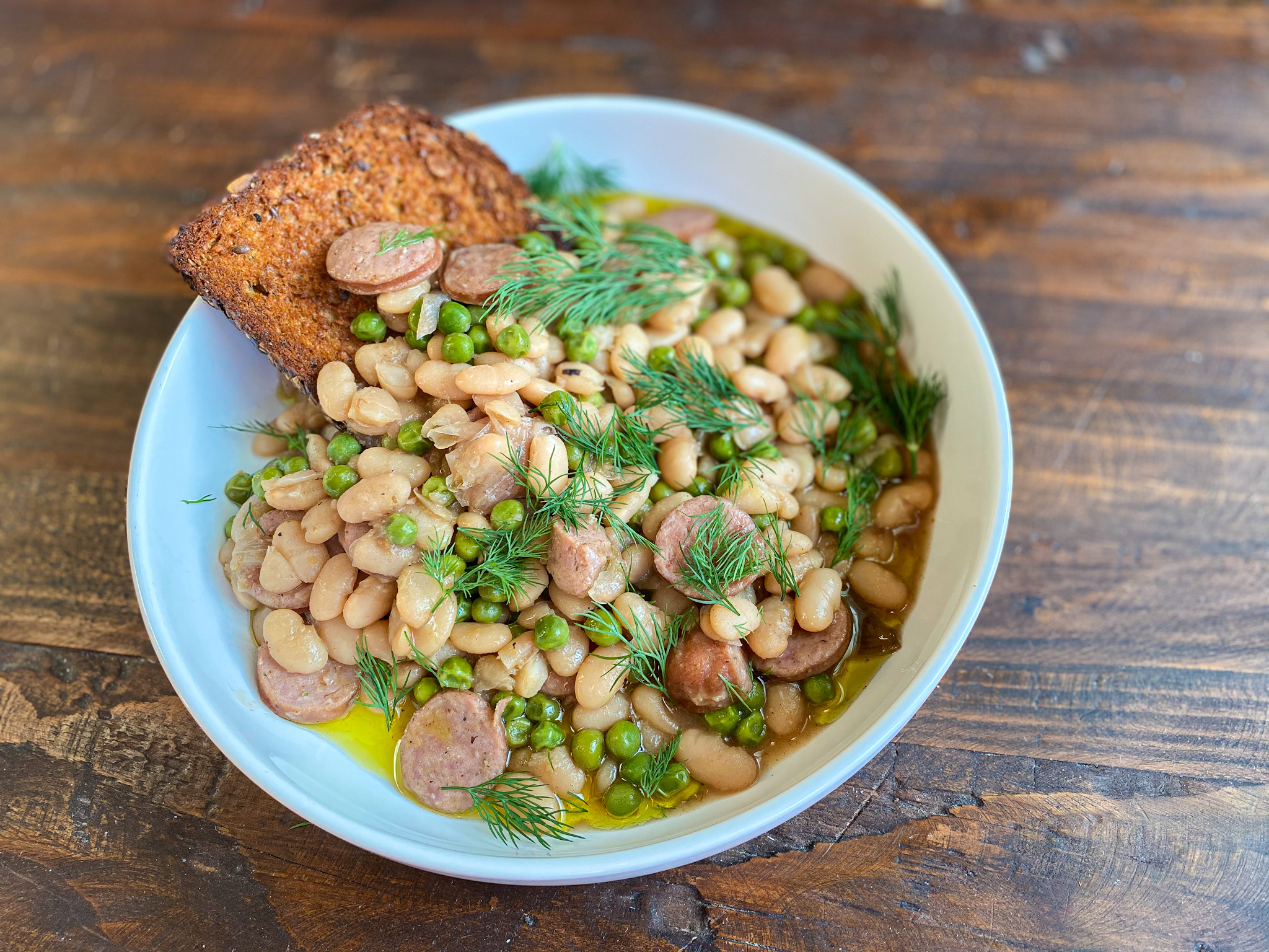 Dashi beans with sausage and Dave's Killer bread