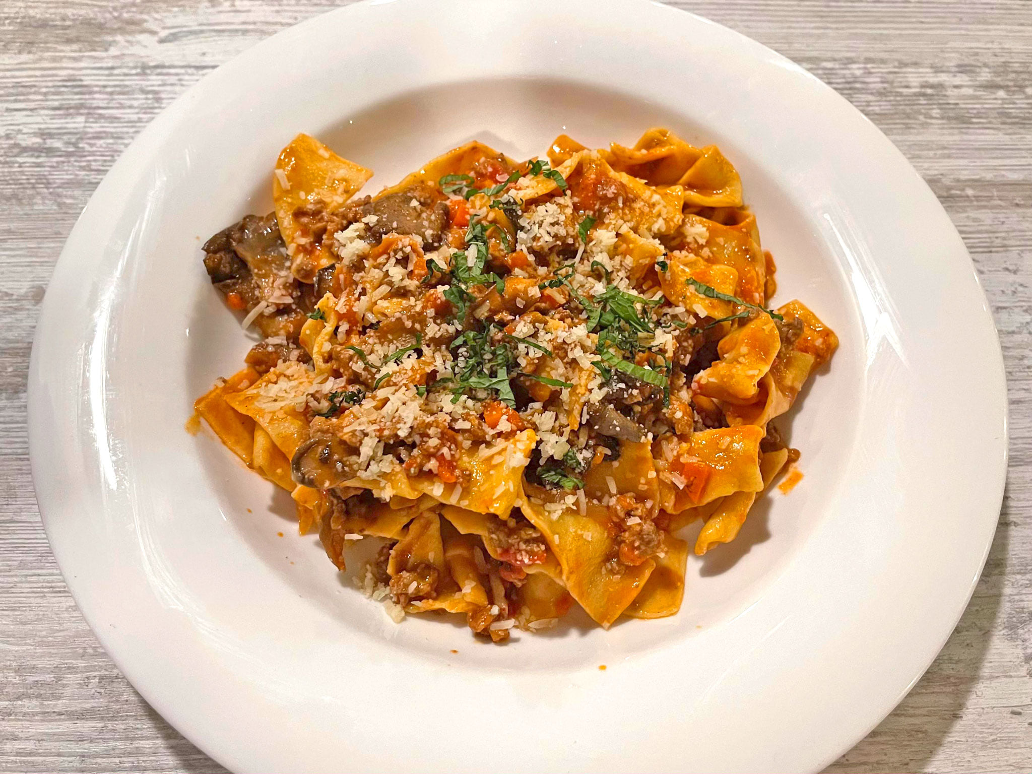 Pappardelle - oyster mushrooms, caramelized Tropia onion, lamb sugo, mint.
