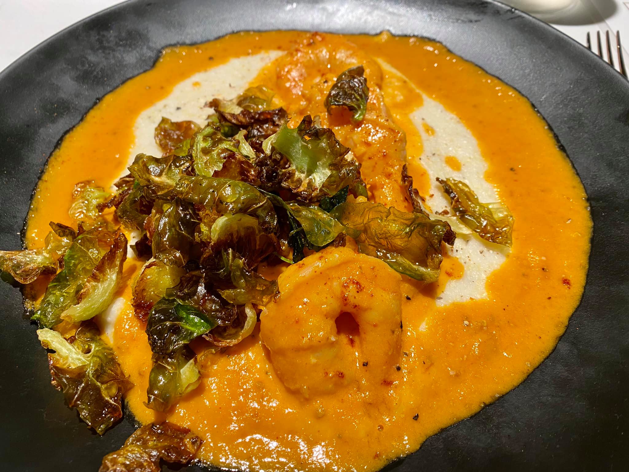 Shrimp & Grits- Blackened Shrimp, Cheese Grits, Fire Roasted Tomato Sauce, Fried Brussel Sprouts