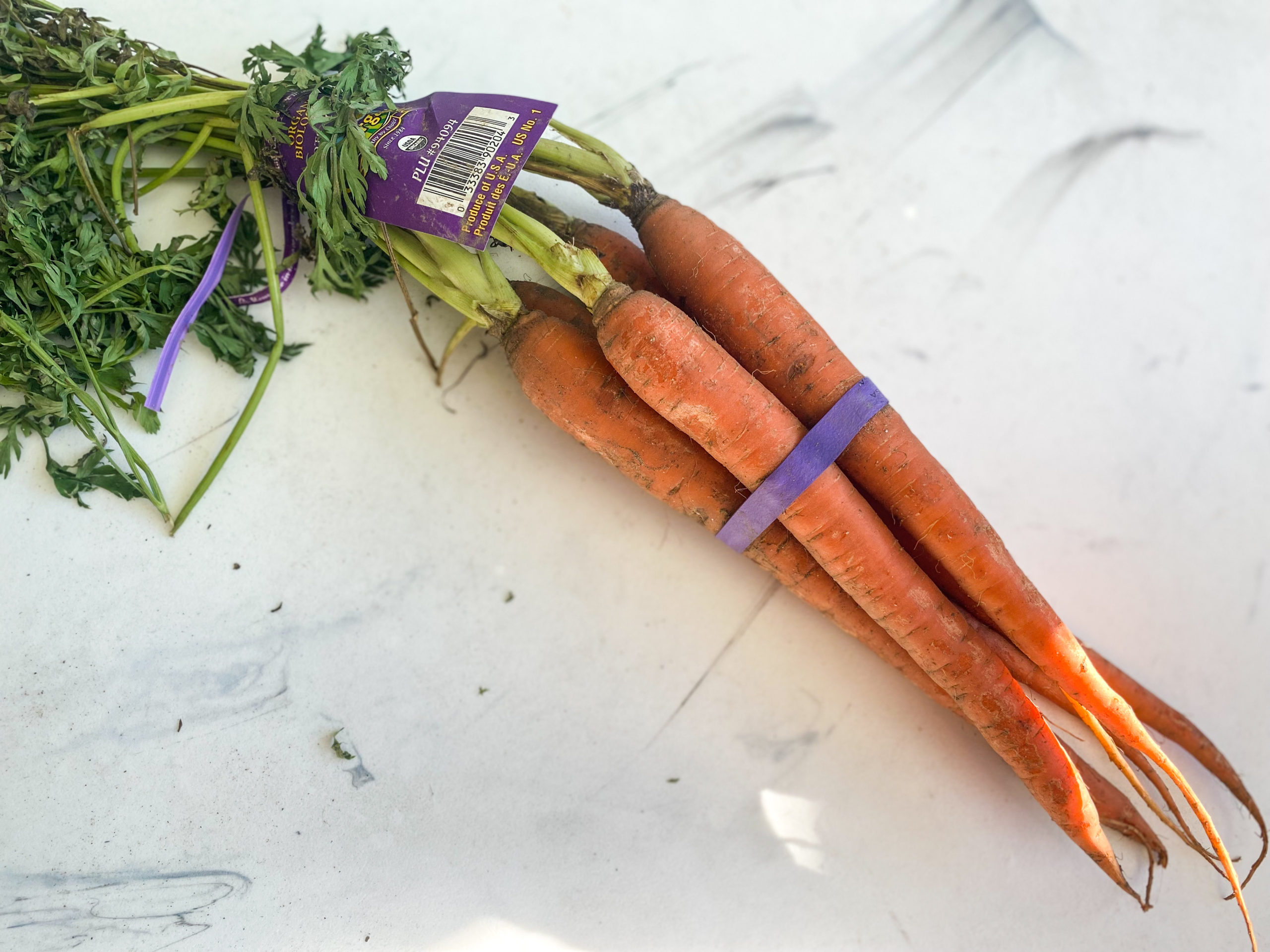 Bunch of whole organic carrots from Rollin' Oats