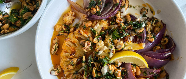 Harissa Cauliflower Steaks with Maple-Tahini and Herby Peanut Crunch