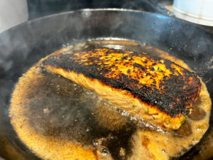 Salmon during the second side sear