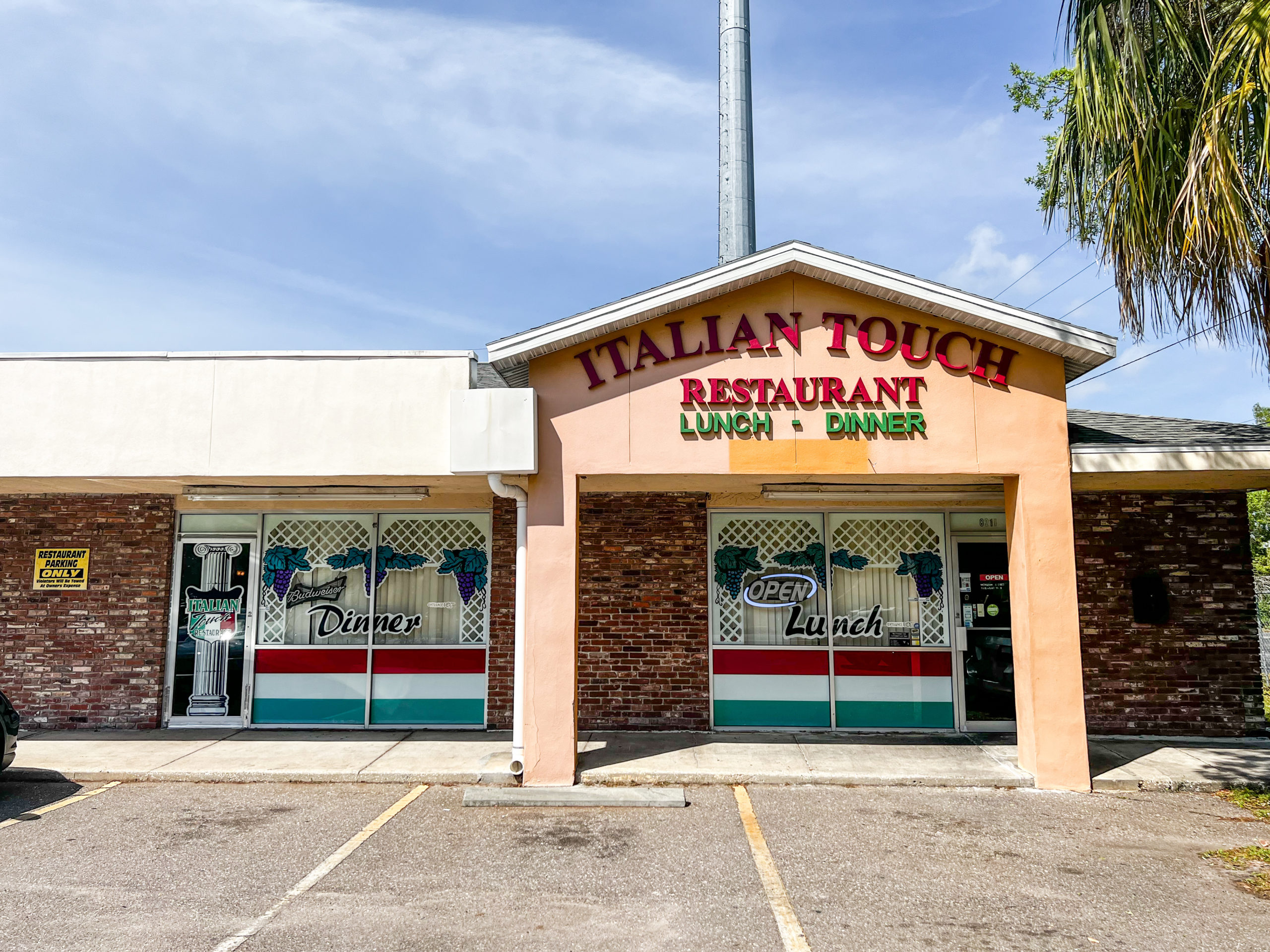 The entrance to Italian Touch located on the corner of Park St. N. and 46th Ave N.