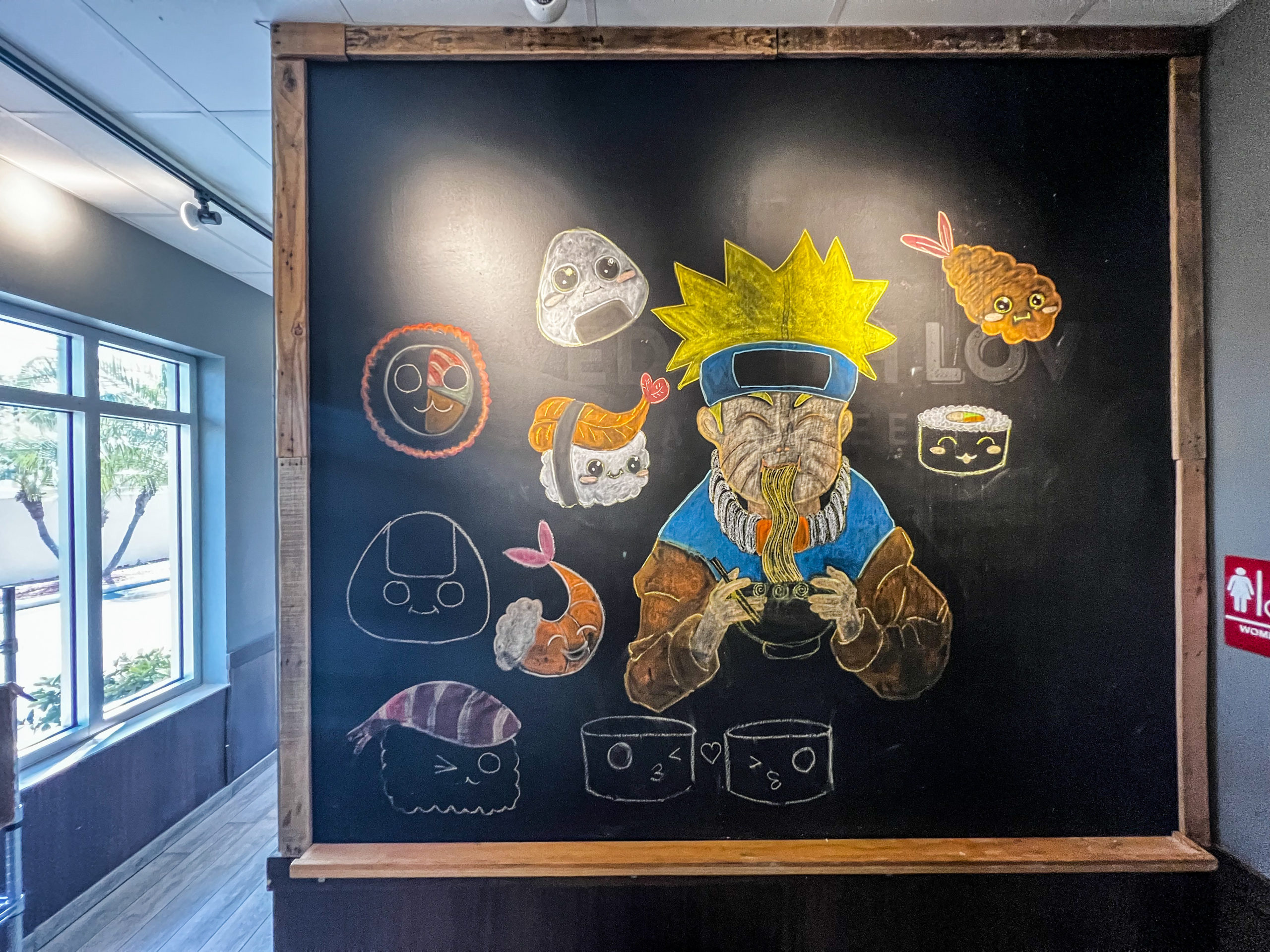 Chalkboard art on an interior wall of Eastern Kitchen & Sushi