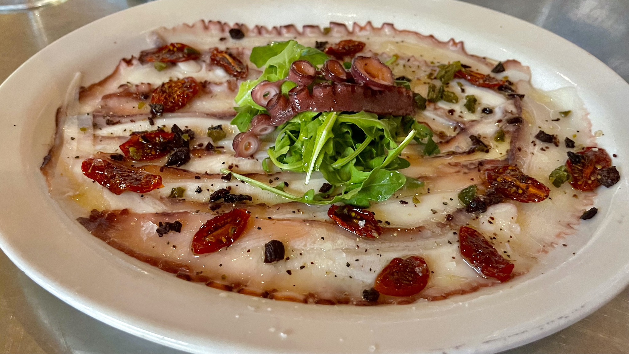 Renzo's Carpaccio of Octopus - Nikkei tiradito of octopus, dressed with evoo and fresh lemon
