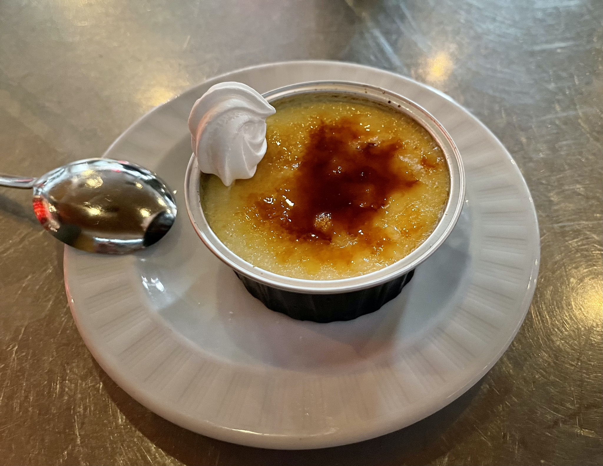 Renzo's Creme Brulee - soft custard with a sugar burn top, offered in traditional style or infused with dulce de leche caramel