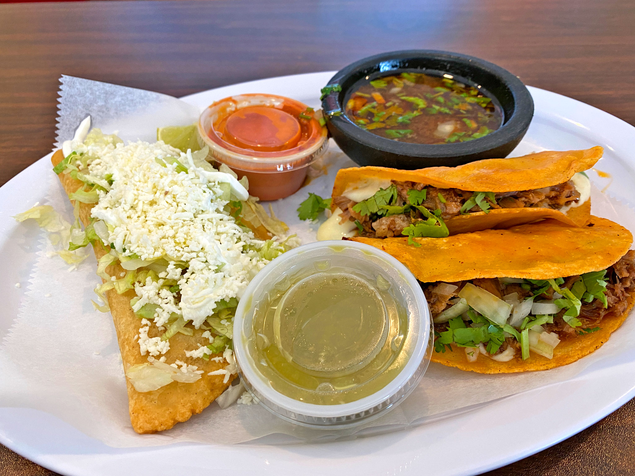 Quesabirria Tacos (R) Chicken Tinga Empanada-(L)