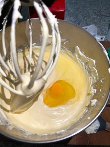 Eggs are added and mixed in one at a time