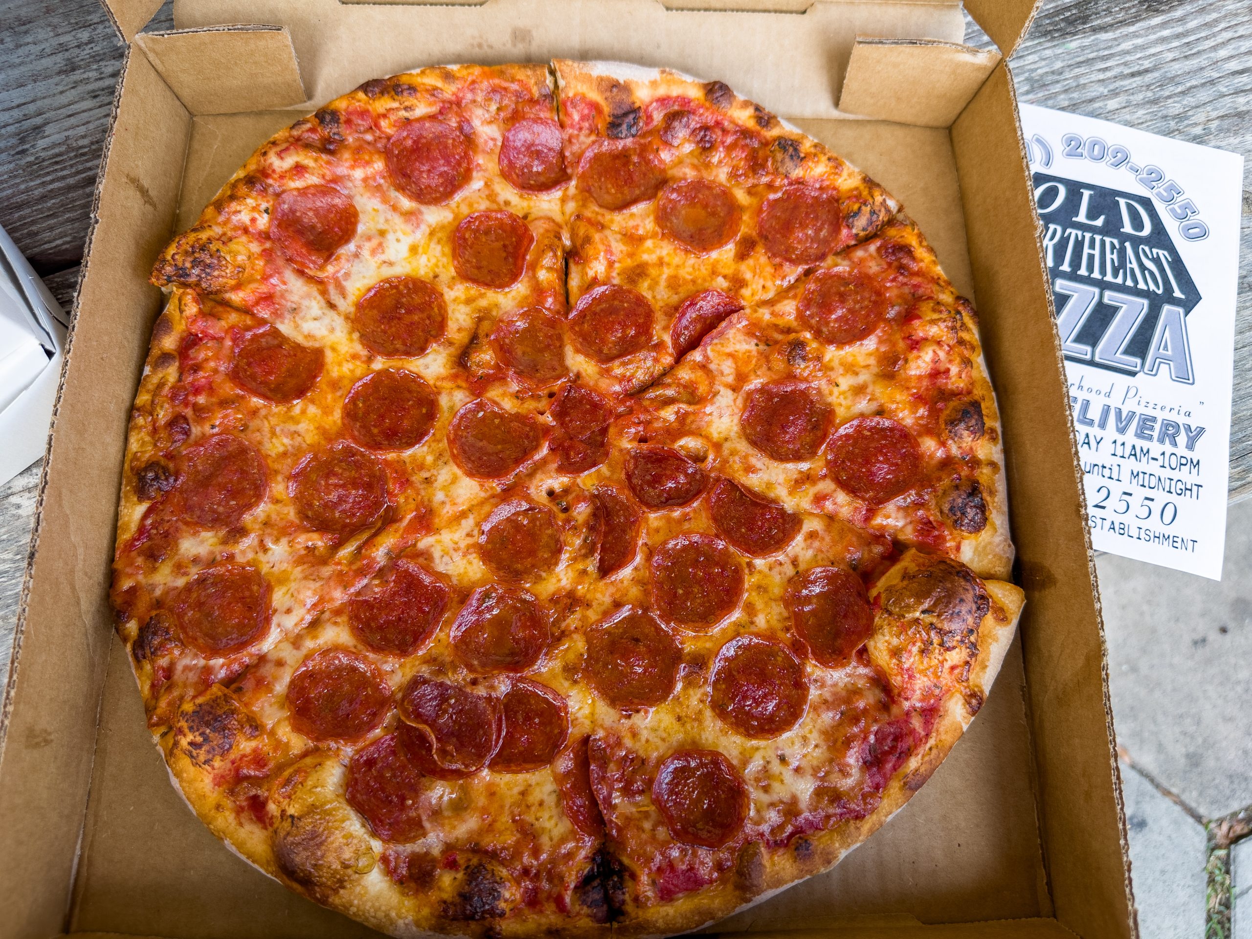 The medium pizza is comprised of six large slices