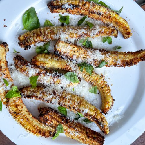 Cacio e Pepe Corn ribs are the fun side dish that your holiday table needs