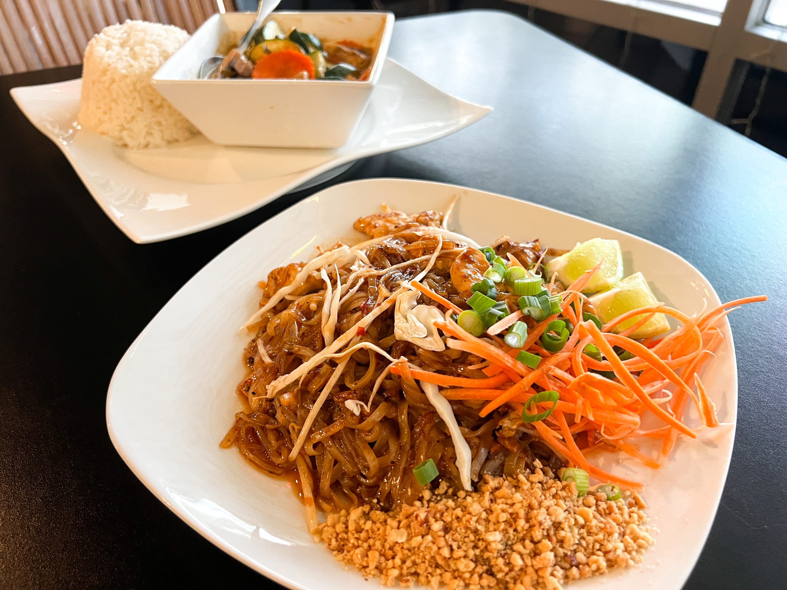 The Pad Thai and the Panang Curry in the background - two of the most popular dishes at Tummy Thai