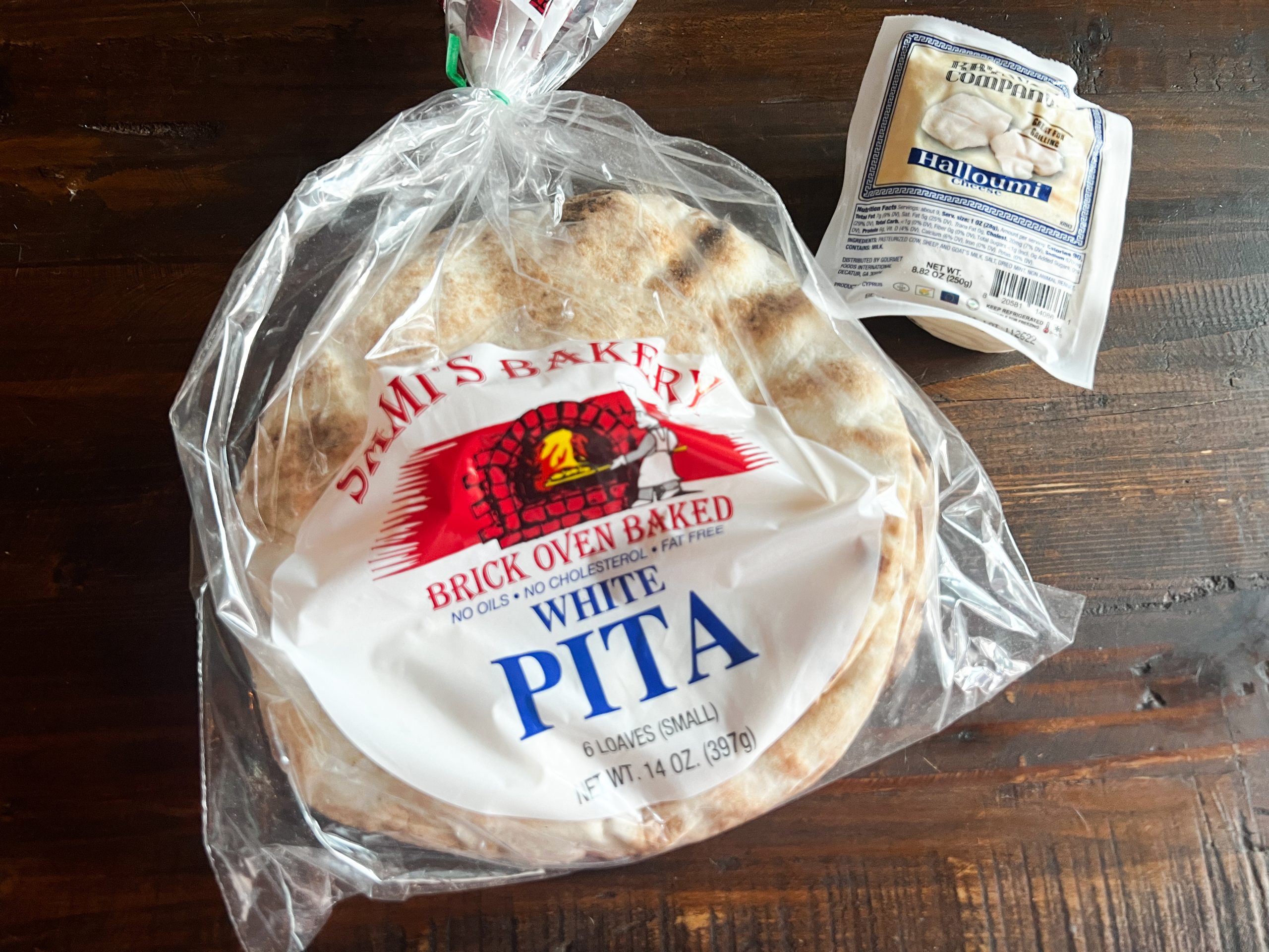 https://stpetersburgfoodies.com/wp-content/uploads/2023/04/White-Pita-Bread-found-at-Rollin-Oats-scaled.jpeg