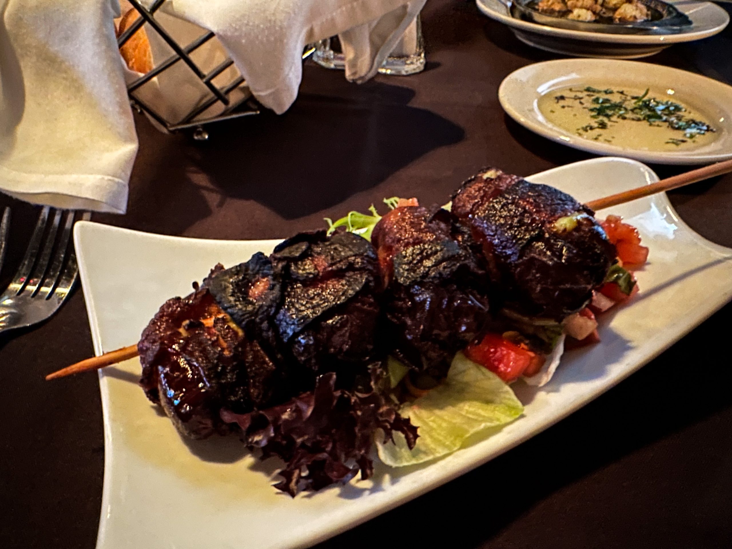 The stuffed dates with goat cheese and jalapeno and wrapped in bacon