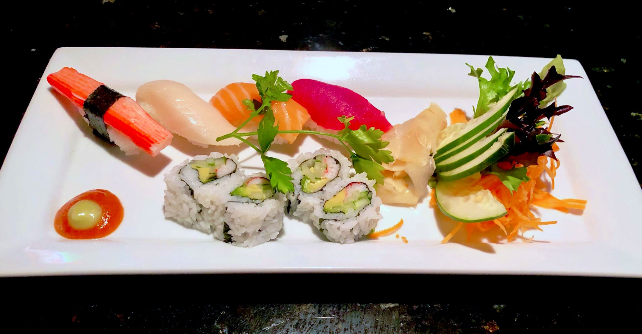 https://stpetersburgfoodies.com/wp-content/uploads/2023/07/Blue-Fugu-Sushi-Appetizer-Nigiri-of-Krab-Yellowtail-Salmon-Tuna-and-California-Roll.jpg