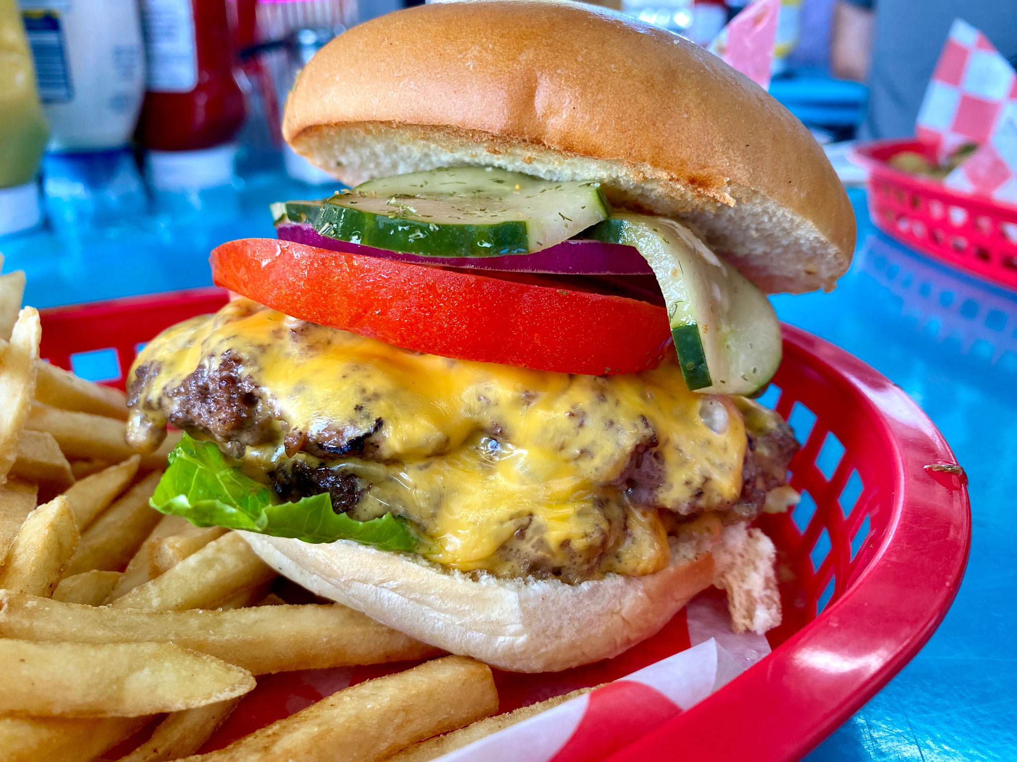 The Ultimate Cheddar Burger! Double cheddar cheese, tomato, red onion, &  spring mix with housemade roasted garlic aioli on a brioche…