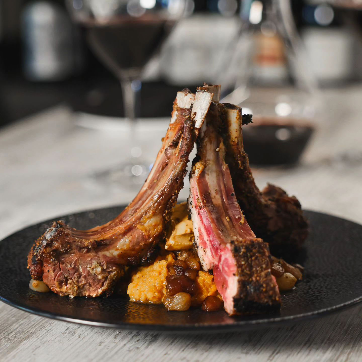 Corriander Crusted Lamb Chops - Sweet Potato Mash, Caramelized Okra, Chipotle Compound Butter