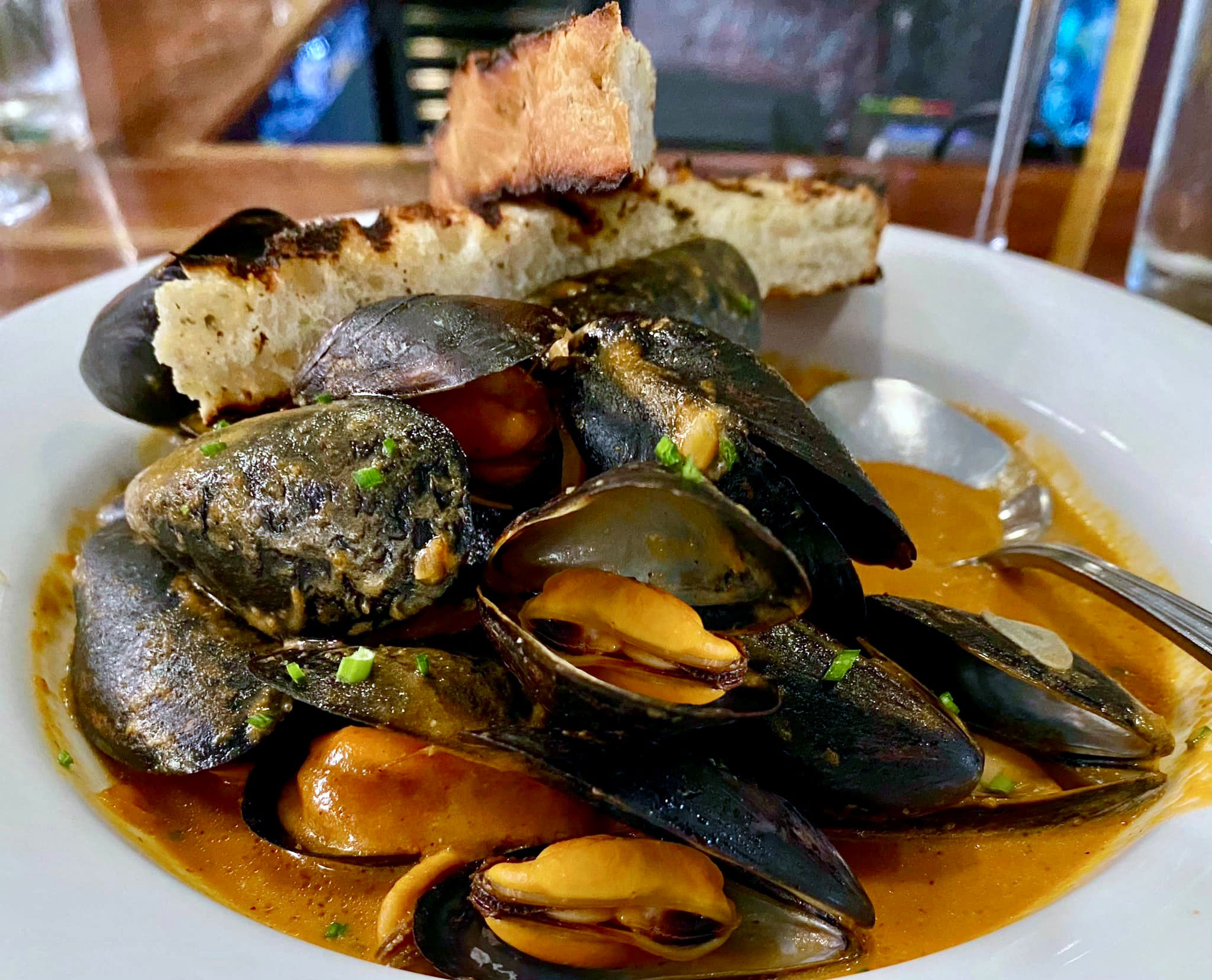 Curry P.E.I Mussels in a beautifully well balanced curry sauce. I dare you to not dip all of that crusted toast in that sauce! Wow! Mussels cooked to perfection.