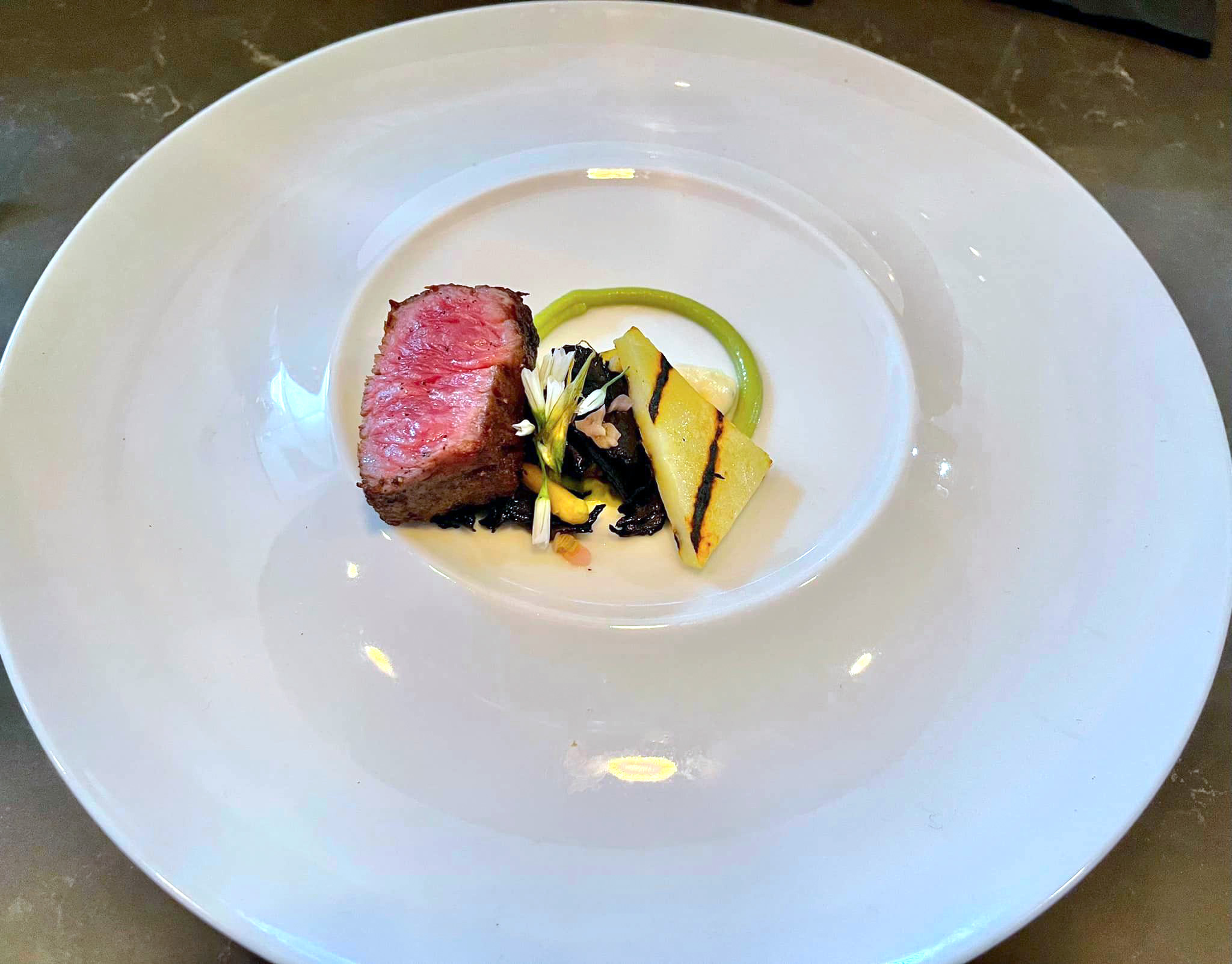 Wagyu with truffle creme and black trumpet mushrooms