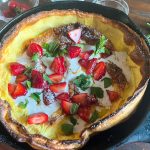 Dutch Baby with Strawberries & Coconut Whip