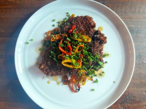Chicken cutlets with hot honey, charred peppers and chives