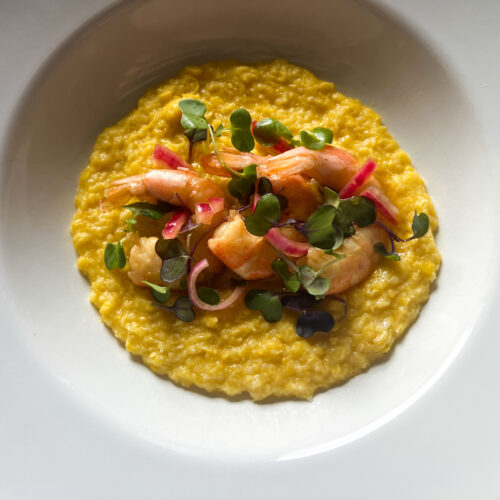 Tangy pickled shrimp are a great pairing with creamy fresh corn polenta