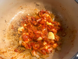 Tomato paste added to the onion mixture