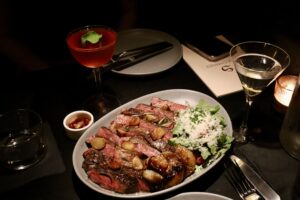 The singular larger offering has been, for the last two iterations of the menu, a steak. This 16 oz. Wagyu Ribeye was not only a treat, but matched the Persephone drink to make for a great photo.